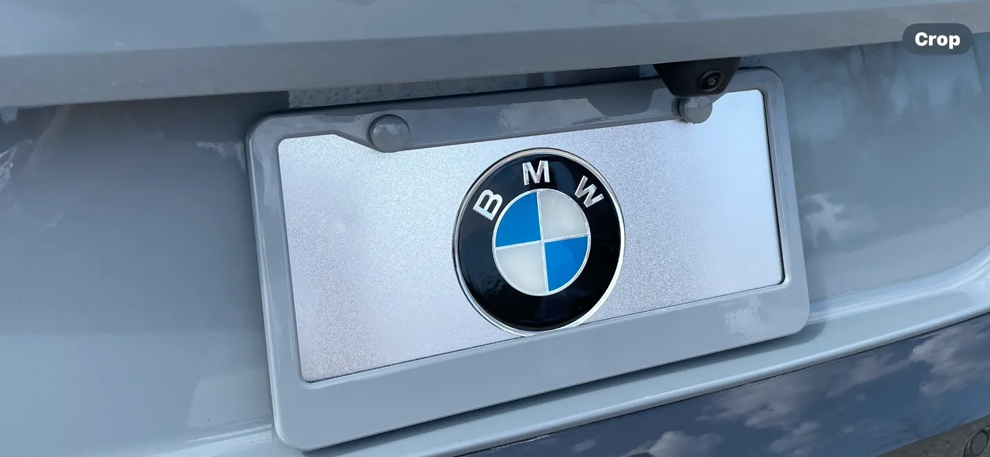 Close-up of a BMW logo on a car.